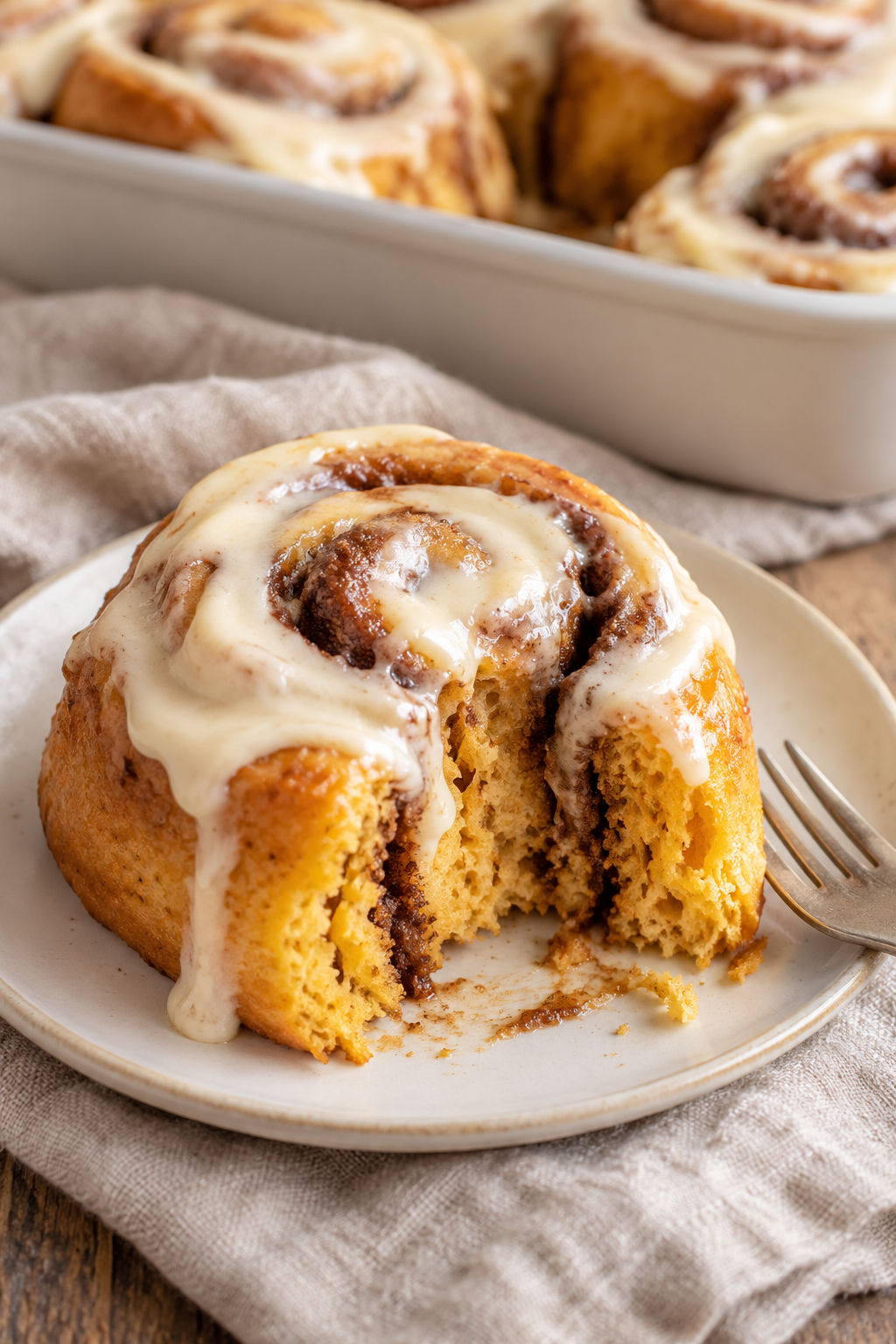Pumpkin Cinnamon Rolls with Maple Cream Cheese Frosting